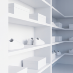 A blue light switch turned off on a white wall in a shoe shop; the far shelves have gone dim.
